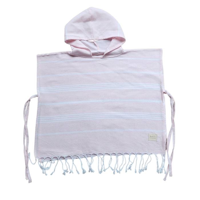 Luxurious kids poncho towel made from 100% organic Turkish cotton, showcasing soft texture and stylish design.