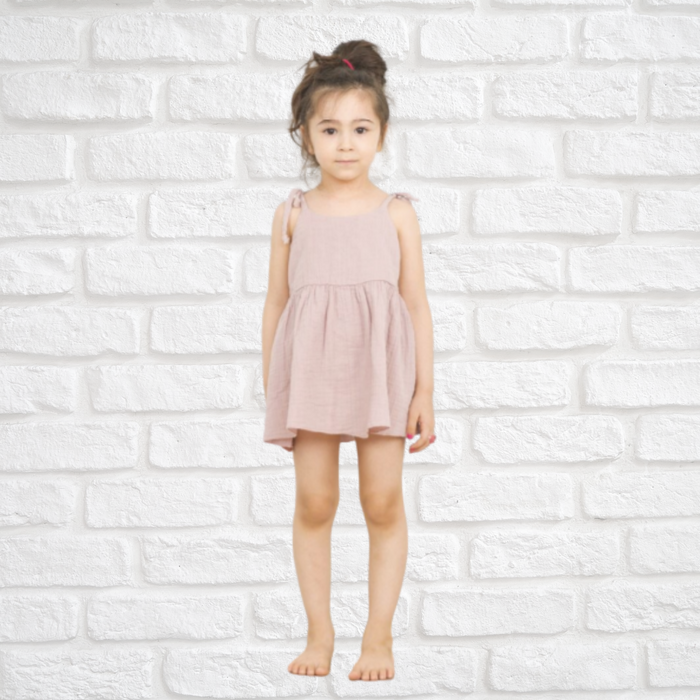 Handmade organic cotton summer dress with breathable fabric and adjustable tie straps