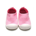 Pink kids mesh shoes with breathable fabric and flexible, non-slip sole.