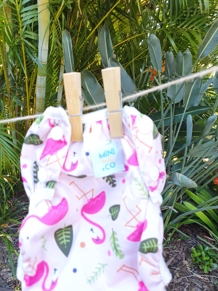 Large Flamingo Swim Nappy: Dive into fun with our large flamingo swim nappy! Perfect for the beach or pool, this swim nappy features a cheerful flamingo design that kids will love. Crafted from soft, eco-friendly materials, it offers a secure, leak-proof fit for toddlers weighing 10kg and up. Reusable and durable, it’s a smart, stylish choice for environmentally conscious parents.