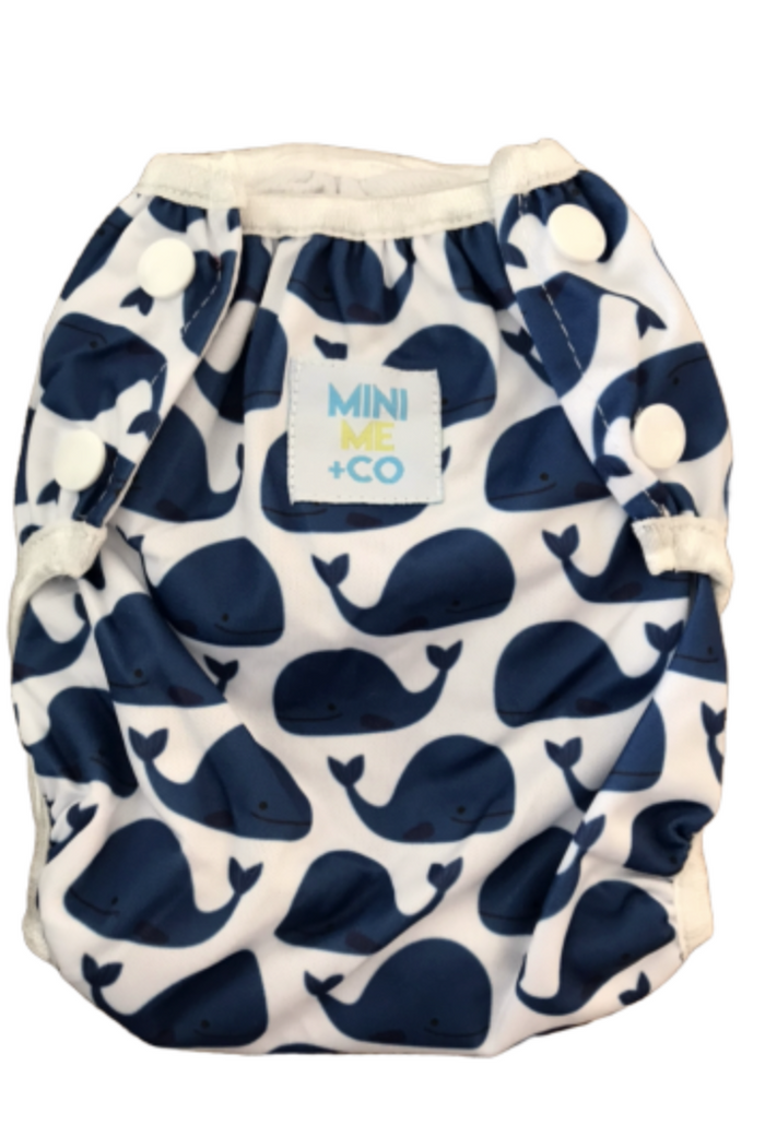 Whale-themed large reusable swim nappy by Mini Me & Co, with soft mesh lining and adjustable fit for babies and toddlers.