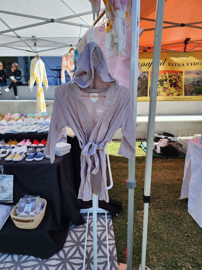 Luxurious beige swim robe for kids, perfect for post-bath or swim time.