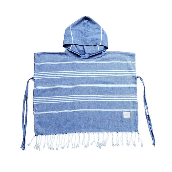 Luxurious kids poncho towel made from 100% organic Turkish cotton, showcasing soft texture and stylish design.