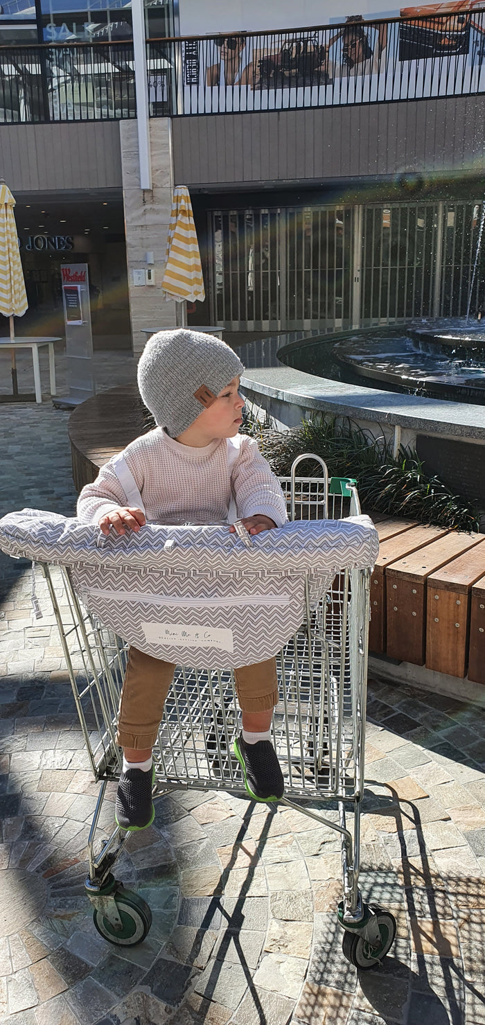 Shopping Cart Cover for Kids: Features a high back, extended sides, and a secure buckle, ensuring your child stays safe and snug in any shopping trolley.