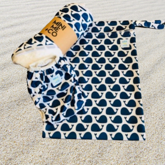 The Whale Ultimate Swim Package includes a charming collection of swim essentials perfect for families. This package features a lightweight, absorbent swim towel adorned with a playful whale print, ideal for drying off after a swim. It also includes a matching waterproof wet bag to store wet items securely, along with a comfortable reusable swim nappy designed for babies and toddlers. This eco-friendly package combines functionality and style for enjoyable beach or pool outings.